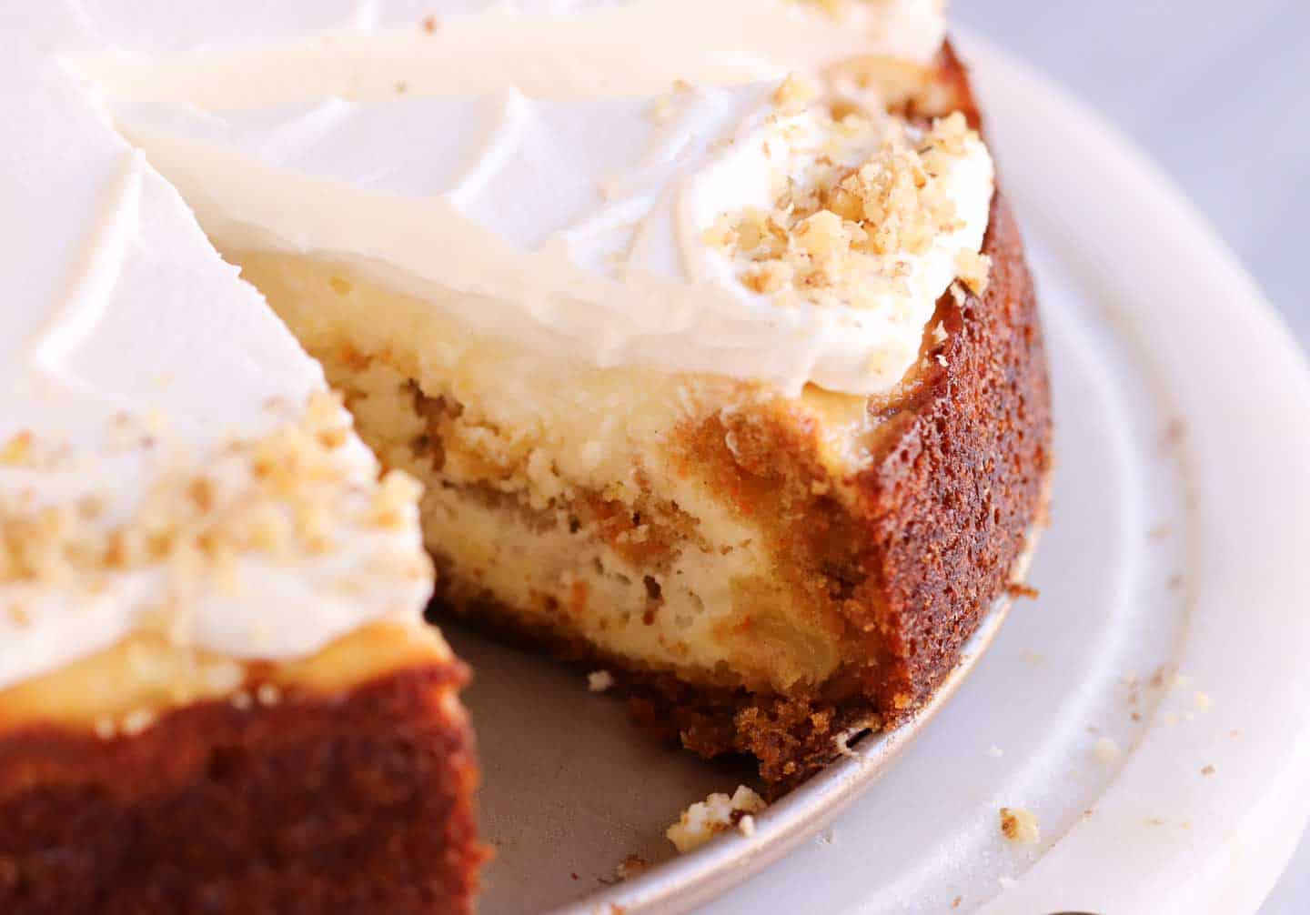 a close up shot of the inside of a carrot cake cheesecake