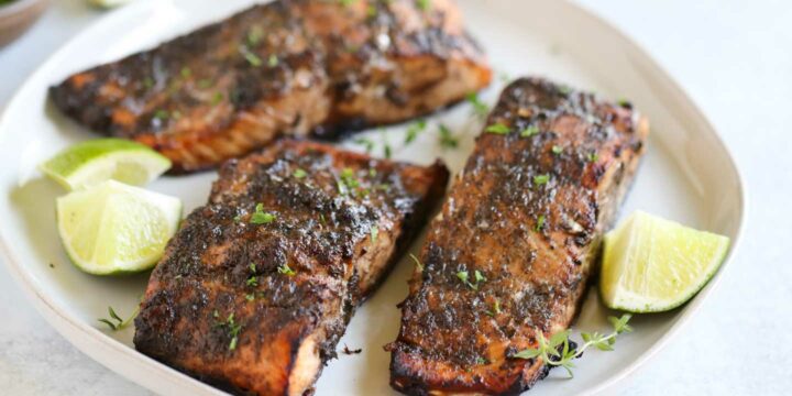 Air-fried jerk salmon fillets with a crispy, caramelized exterior.