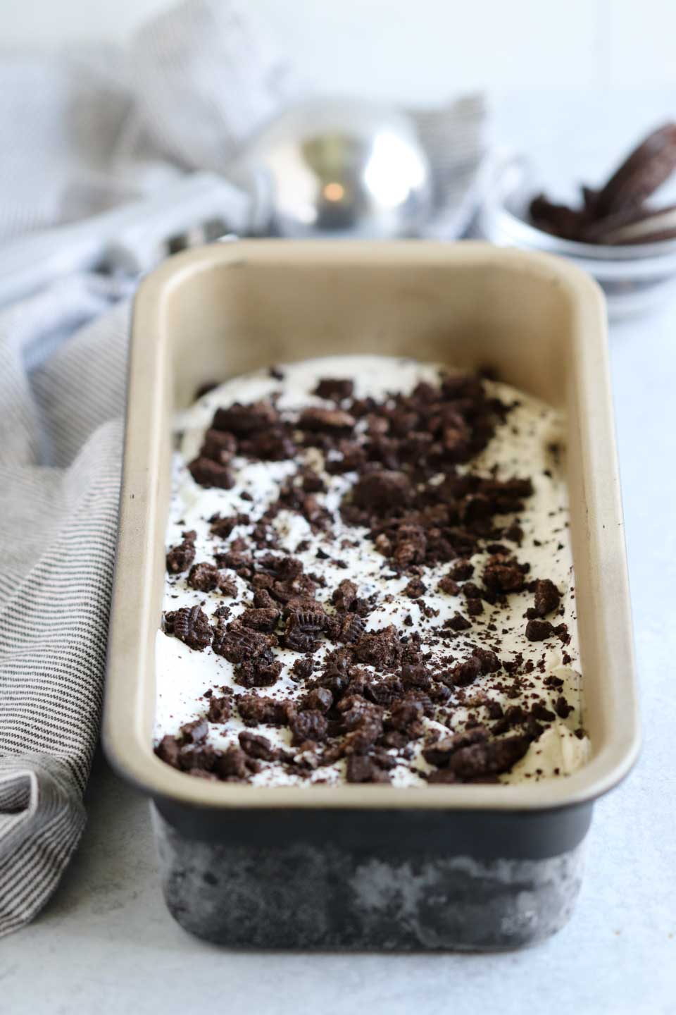 crushed oreos sprinkled on tip of ice cream